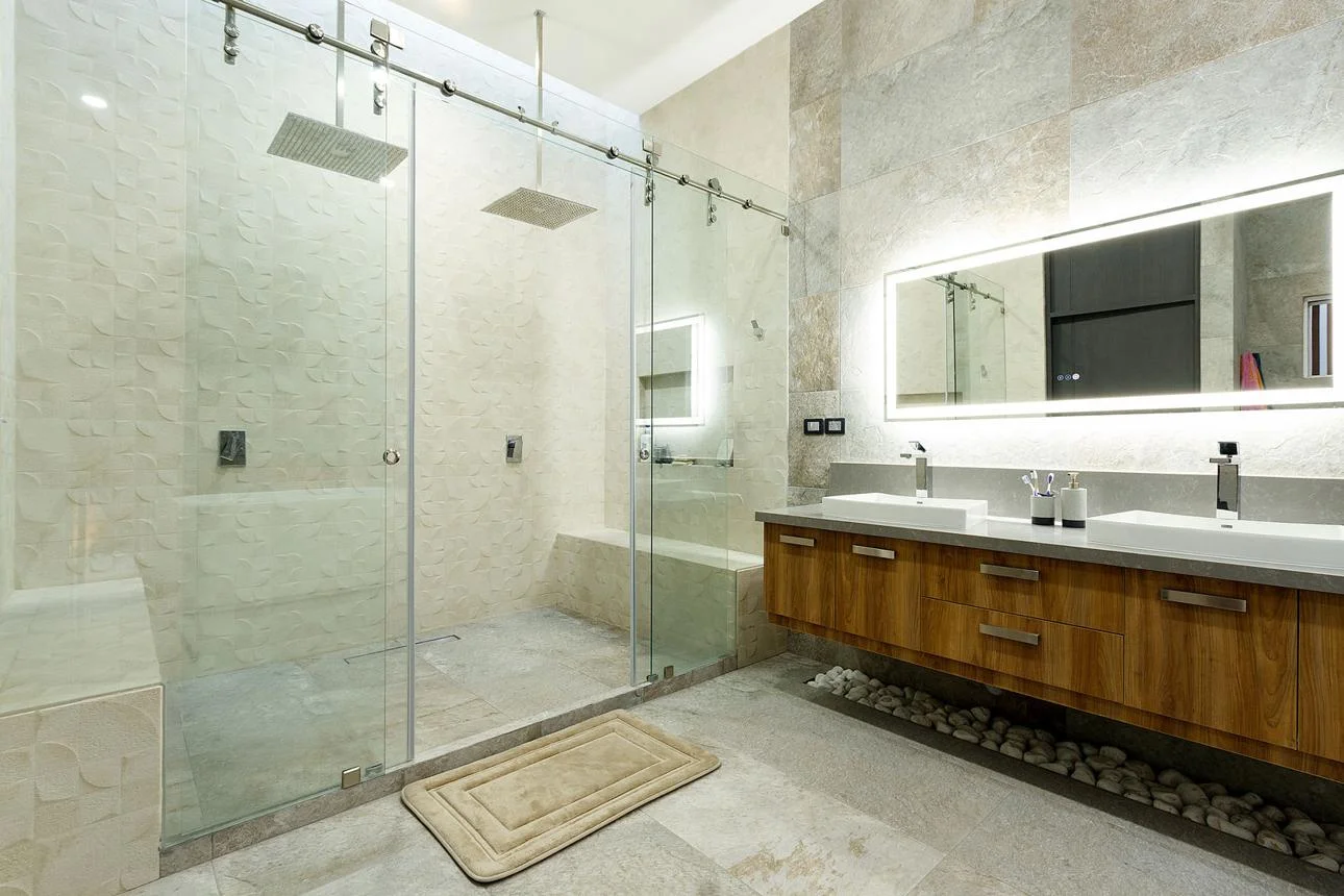 Modern bathroom with elegant glass shower enclosure and contemporary fixtures